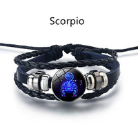 Scorpio Soul Bracelet - black braided leather with glowing Scorpio zodiac charm