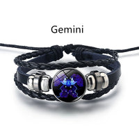 Gemini Soul Bracelet - black braided leather with glowing Gemini zodiac charm